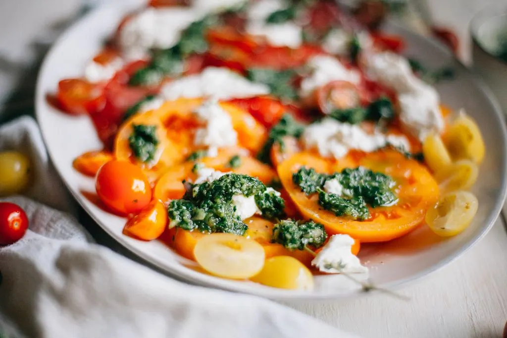 Heirloom Tomato Salad with Burrata and Herb Pesto - Tastemaker Blog