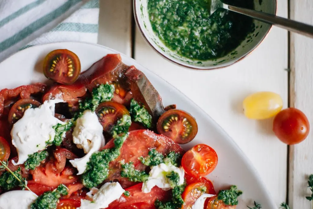 Heirloom Tomato Salad with Burrata and Herb Pesto - Tastemaker Blog