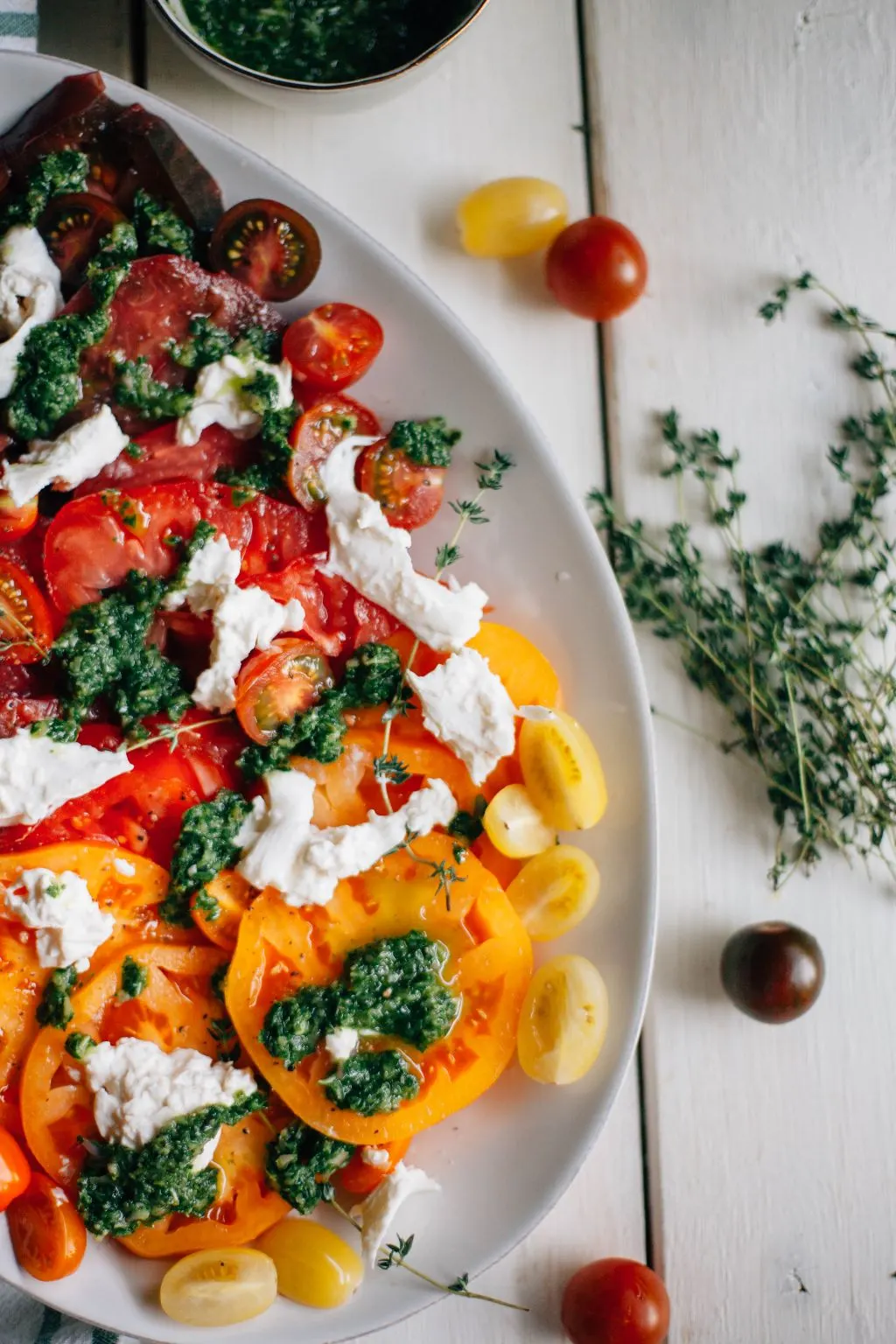 Heirloom Tomato Salad with Burrata and Herb Pesto - Tastemaker Blog